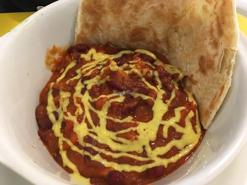 Red bean and tomato sauce with coconut curry sauce on top at Paradis Marguerite in Paris