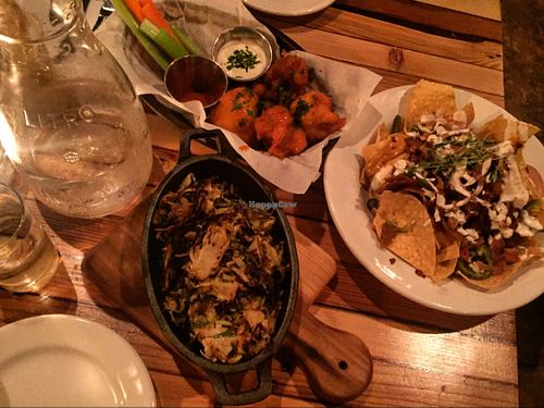 cauliflower wings, loaded nachos and shredded brussel sprouts  at The Beer Plant in Austin