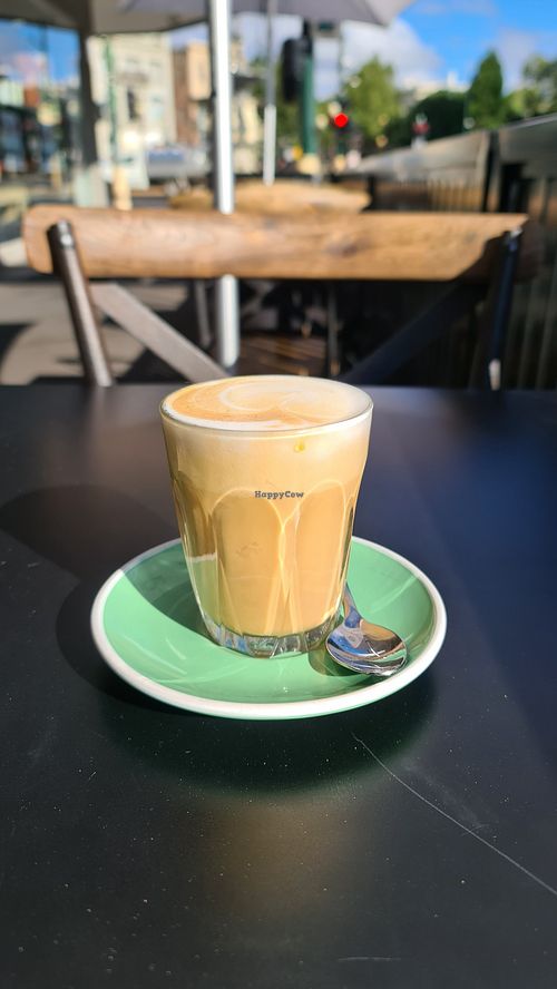 Enjoying an almond latte in the sun, outdoor seating at Hoo Gah in Bendigo