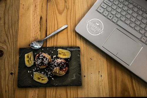 Foodprintz-made banana and date ice cream with warm berry sauce at Foodprintz Cafe in Lisbon