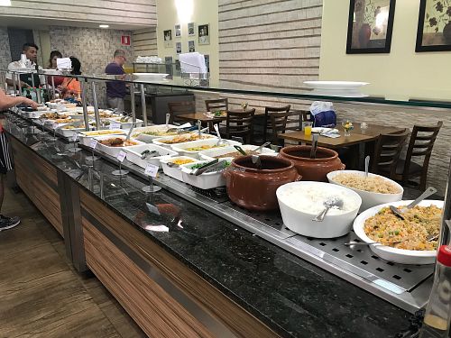 Endless hot dishes counter at Loving Hut - Jardins   in Sao Paulo