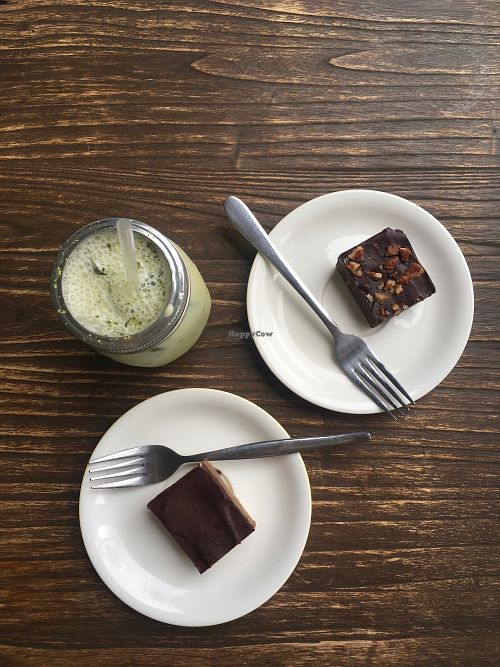 Raw desserts and an almond milk matcha latte. at Pineapple Cafe in Cairns