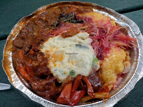 A medium lunch - seitan, spareribs, cornmeal, plus potatoes & salad at Vegan's Delight in Bronx