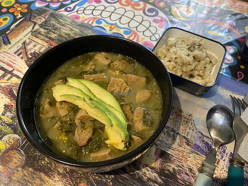 Spicy green soup with soy meat and rice  at Los Alebrijes Veg in Mexico City