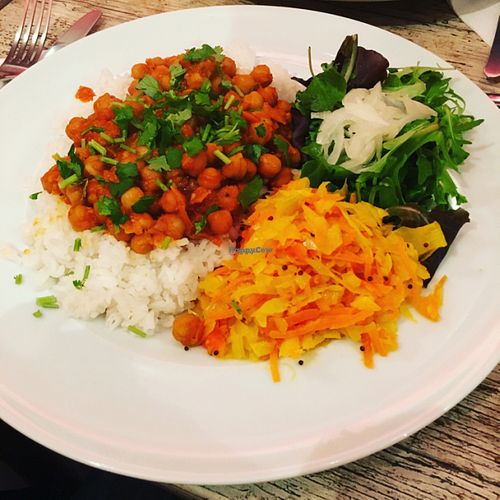 Chickpea Curry with rice and two different salads. at Pomodoro's in Antibes