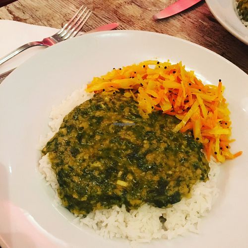 Lentil Spinach Curry served with rice and carrot at Pomodoro's in Antibes