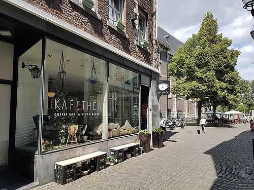front, benches on one side (terrace around the corner) at KAFETHEA in Maastricht