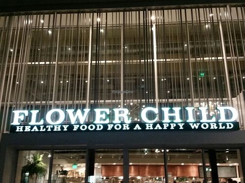 signage at Flower Child in Santa Monica