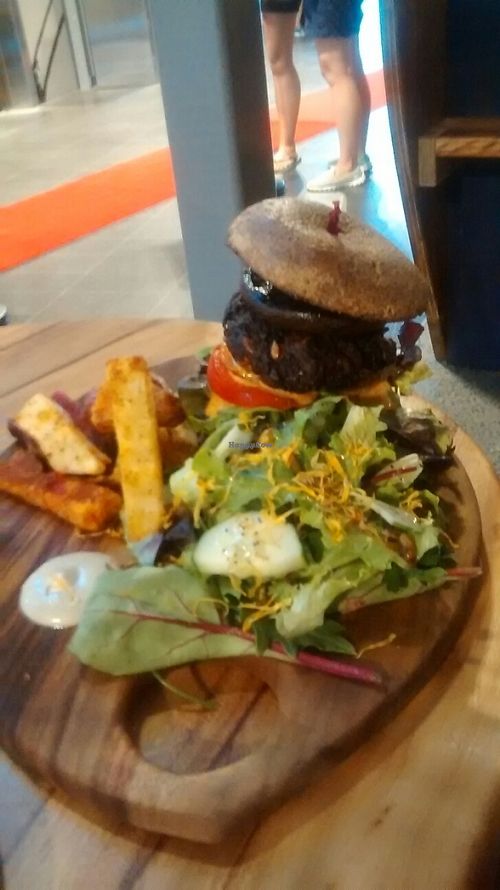 burger with mushroom, vegan patty, served with beet sweet potato and potato chips salad at Elixiba - Robina in Robina