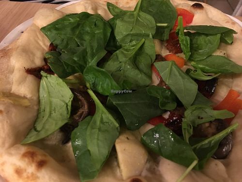 Pizza with artichoke and spinach at Vegan Express in South West London