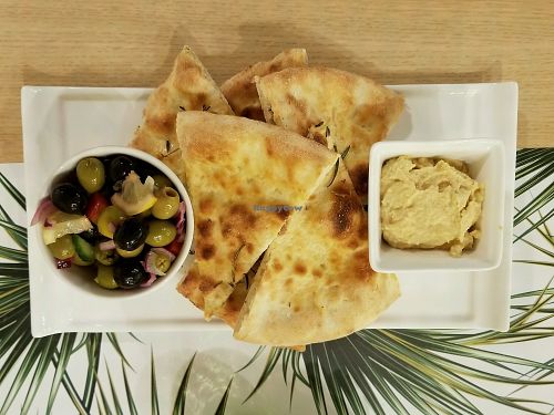 toast with hummus and olives at Vegan Express in South West London