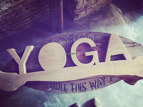 Our handcrafted yoga sign to show you the way to your  better happier self. at Wholey Wonder in Penang