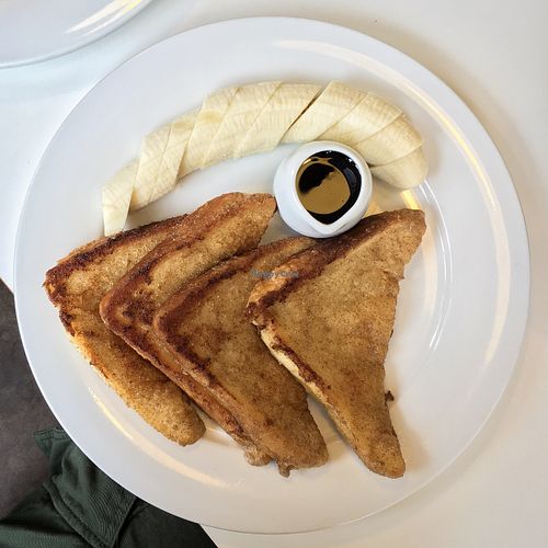 vegan french toast with banana and maple syrup. BEST FRENCH TOAST EVER - sweet, cinnamon, gooey, crispy edges - YUM at Rose and Grants in Glasgow
