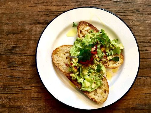 Vegan avo toast w/ lime, coriander and chilli on sourdough. at Exchange Coffee Shop & Kitchen in Bristol