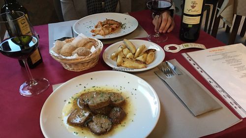 Roasted seitan, lasagna, roasted potatoes at La Tecia Vegana in Venice