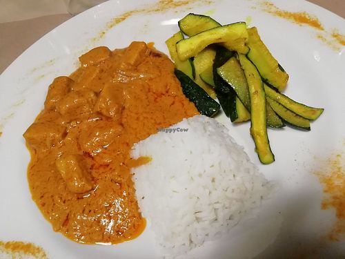 Tempeh mafe with tomatoes, onion, and peanut paste at La Tecia Vegana in Venice
