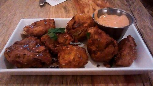 Artichoke nuggets with red pepper aioli. at The Arbor in Vancouver