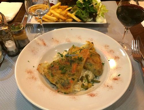 Vegan samossas (filled with various vegetables and soy protein over a creamy vegan risotto. at L'Apollinaire in Paris