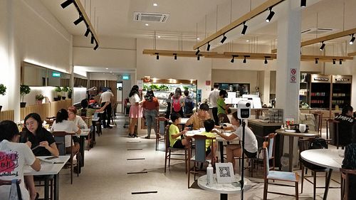 Restaurant interior. Crowded during Sunday lunch hours at Green on Earth 绿之天地 in West Singapore