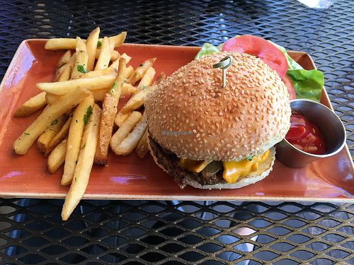 Vegan burger with garlic fries at Alvarado Street Brewery and Grill in Monterey