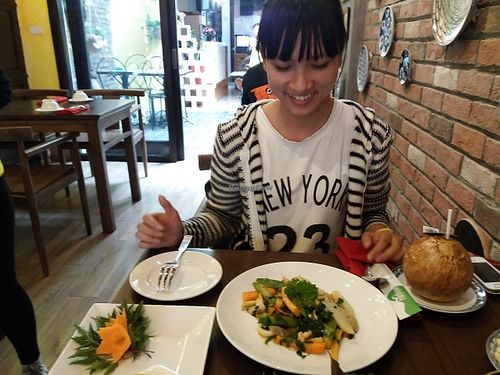 She said WOW to the delicious vegan food. at Minh Chay - Hang Gai in Hanoi