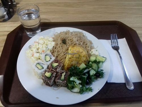 Rice noodles, ";egg"; roll, sushi, vegetables from buffet at Veganio in Prague