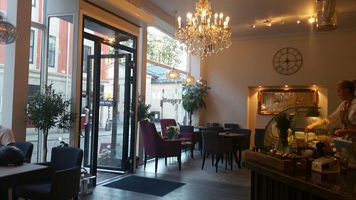 The interior. With a fancy chandelier. at Nordvegan in Oslo