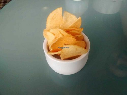 Small ramekin of chips on the side at Musicker in Isle Of Bute