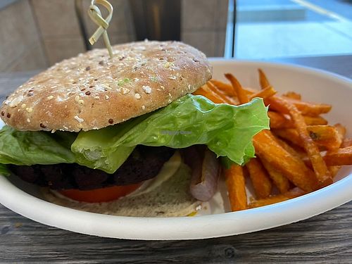 Falafel burger with sweet potato fries  at Nzuko in Framingham