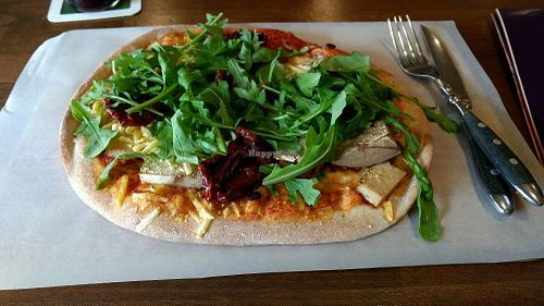 Cocas - Catalonian Pizza with Tofu, dried Tomatoes and Rucola. at Tapas & Co in Marburg