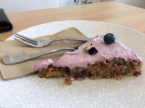raspberry cream topped gluten free cake  at The Origin in Christchurch
