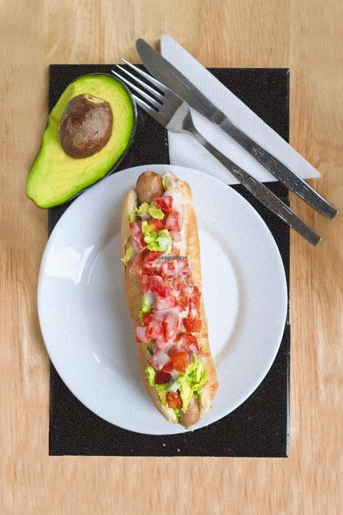 Sandwich Acacia: it contains tomato, avocado, vegan mayonnaise and tofu sausage, all in bread. It is really delicious and a vegan version of a typical chilean food! at Arvoleda in Santiago