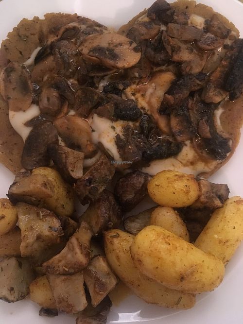Seitan with mushrooms, potatoes, and Jerusalem artichokes  at Un'Altra Idea in Bologna