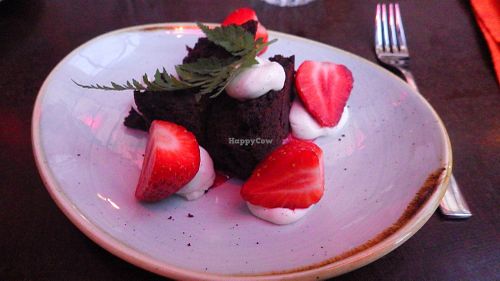 Chocolate cake, seasonal berries, Spanish chervil at Vaxthuset in Stockholm