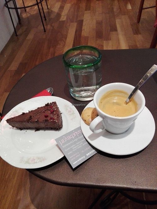 Chocamole raw chocolate vegan cake and decaf double espresso. Both of great quality! at Melikrini in Athens