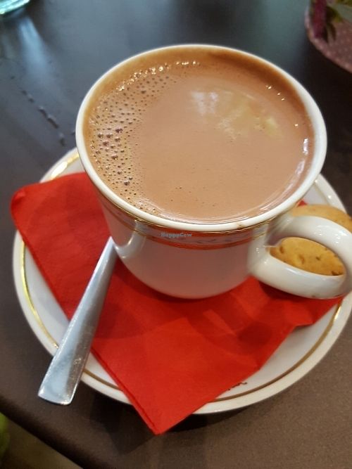 vegan hot chocolate with baby cookie at Melikrini in Athens