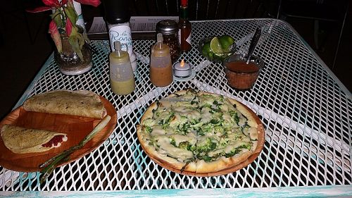 Vegan pizza with almond cheese at La Rana Vegana in Cabo San Lucas