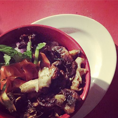 Rice bowl with mushrooms and artichoke at Zazu Bar and Bistro de Paris in Kralendijk