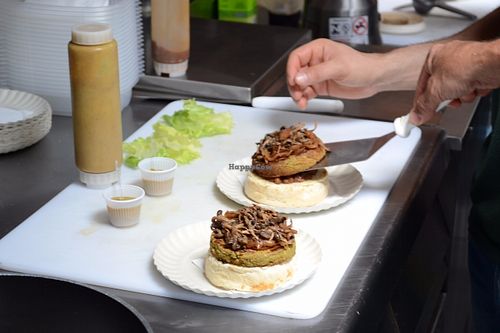 Preparing sandwiches at Ahimsa Burgers in Florianopolis