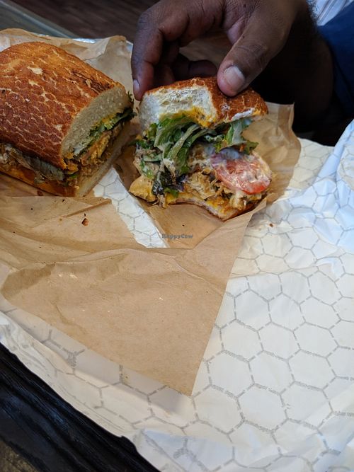 Double crunch chicken melt with lettuces, tomatoes, ranch dressing at The Veg Hub in Oakland