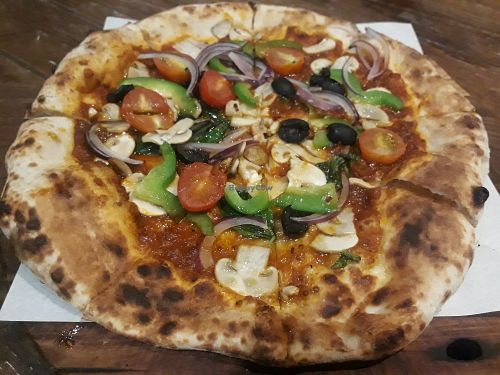Veggie pizza without cheese at Adirak in Chiang Mai