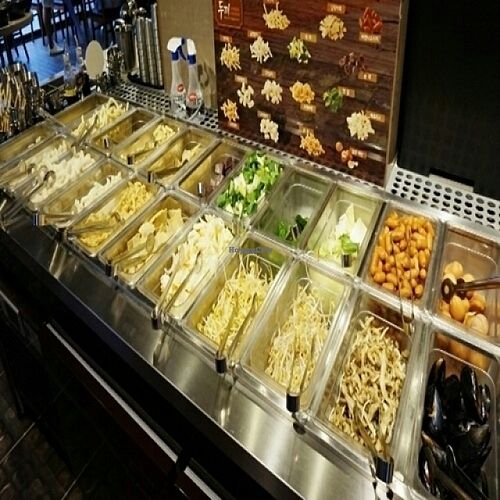 buffet where you choose veggies and rice cakes at Dooki Ddeokbokki - 두끼떡볶이 강남점 in Seoul