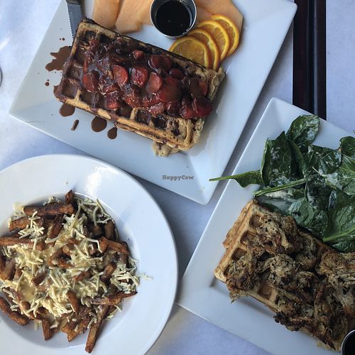 Poutine, Gaufres aux fraises et Chicken & Waffles at Vegano in Montreal