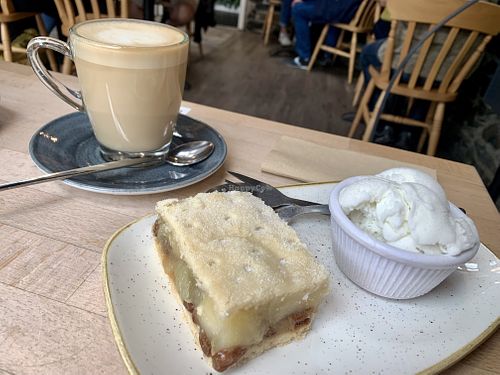 Apple pie and ice cream with oat milk latte at The Apple Pie in Ambleside