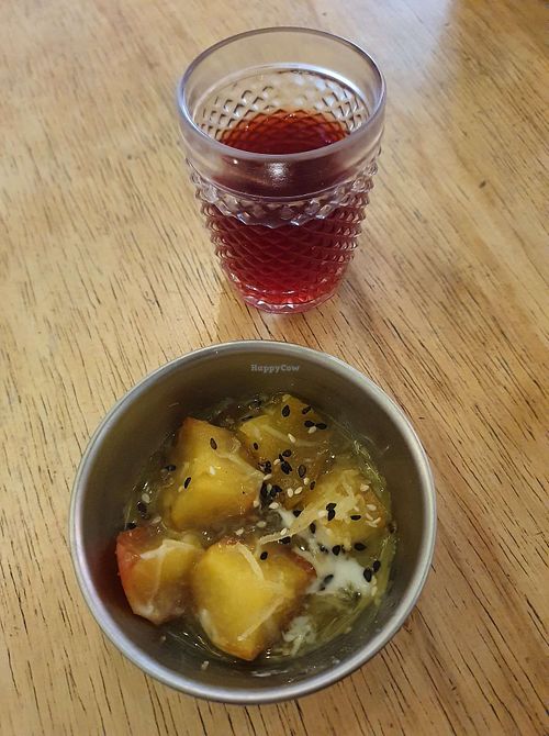  Dessert:
 - Apple jam with coconut topping, sesame and cinnamon farofa
  -  Jamaican flower tea with pineapple and honey at Mantra Gastronomia e Arte in Porto Alegre
