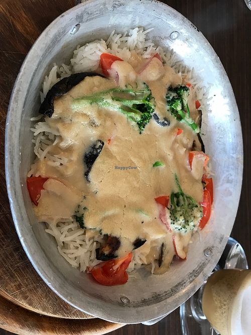 “Siniya” casserole with vegetables in tahini sauce on rice at Malachin in Even Yehuda