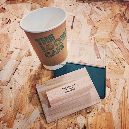 Logo compostable cup at The Lookout Cafe in Poole