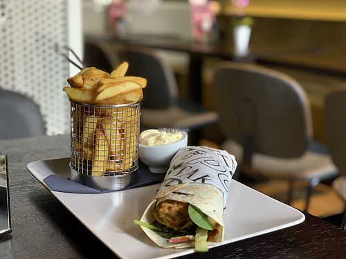 Crispy no chicken wrap and fries at Mooshka in Amsterdam