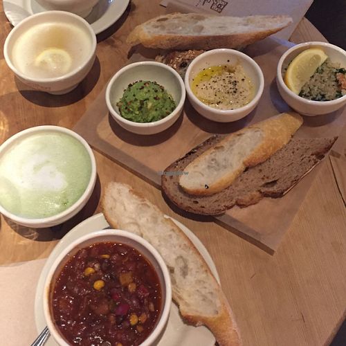matcha latté, lemon & ginger tea, chili, and avocado, hummus, and tabouli at Le Pain Quotidien - Michigan Ave in Chicago