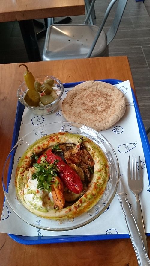 8 out of 11 menu item includes pita, salad & pickles.  at Hummusology in Philadelphia